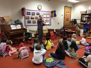 Timpanist Peter Zlotnick demonstrates percussion instruments for young children