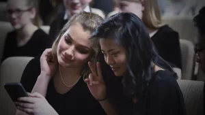 Two Youth Symphony students posing for a selfie