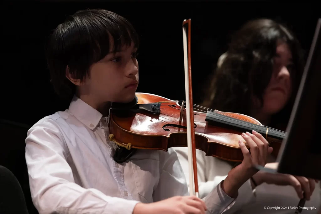 Youth Orchestra member in concert, November 2024