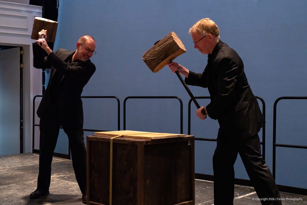 Percussionists John Beck and Wiley Sykes in the double-hammer blows of Conor Brown's "How to Relax with Origami"